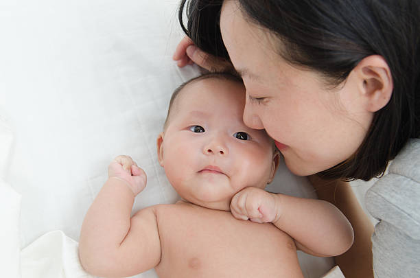 mother looking at baby