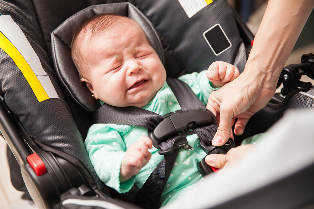 baby crying in car seat stroller
