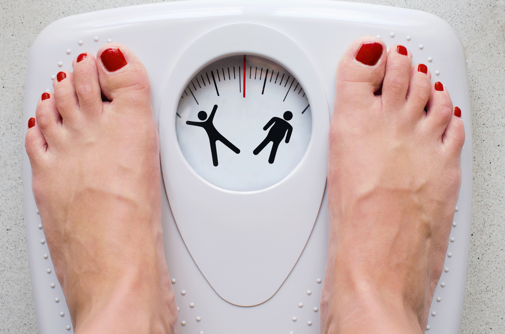 Pre-menopause symptoms - weight gain on weighing scale