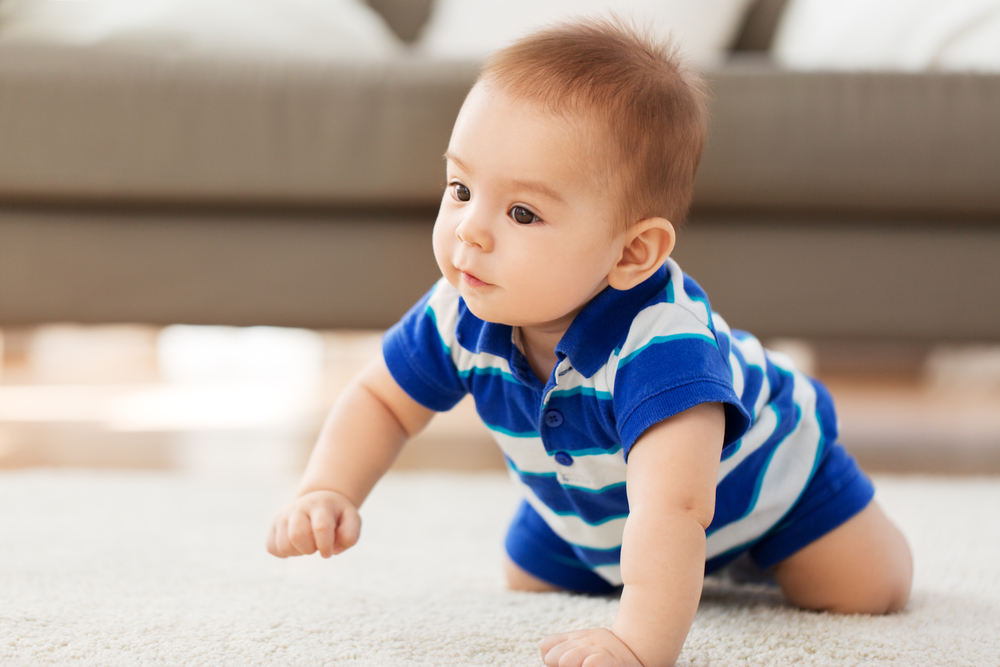 developmental milestones baby boy crawling