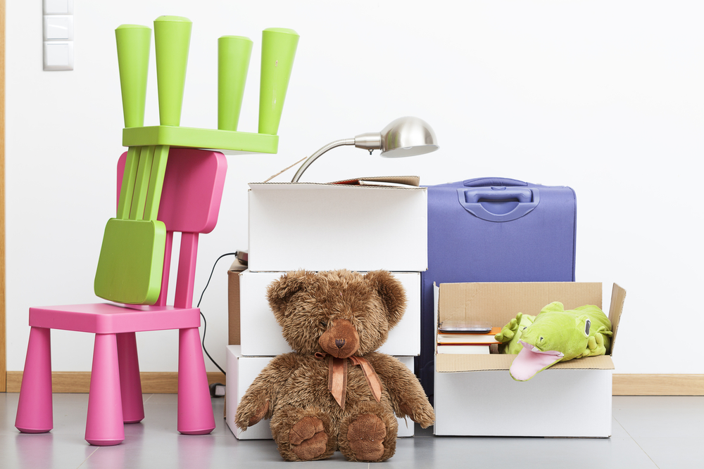 used household objects, teddy bear toy, chairs and boxes